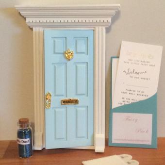 Opening blue fairy door